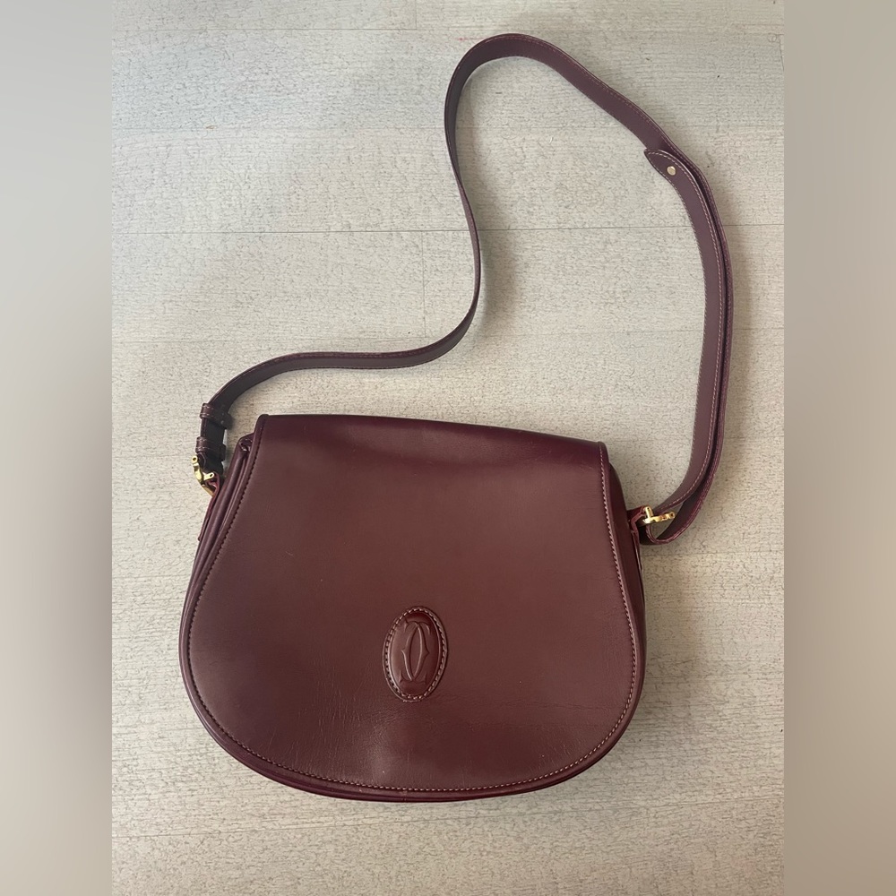 Cartier red leather saddle bag